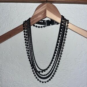 Multi strand gunmetal & crystal black necklace